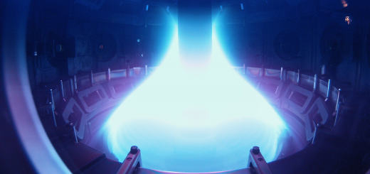 A brightly shining cone of plasma of blue color in a fusion reactor.